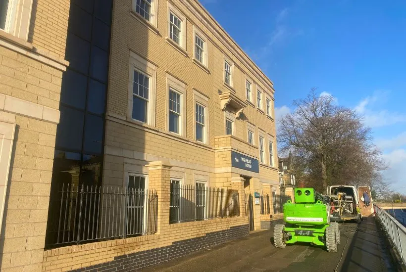 - Waterloo House Stone Cleaning 1 A stone building facade after cleaning